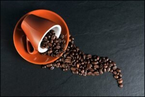 Coffee-cup-saucer-coffee-beans